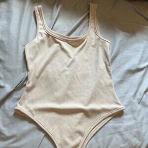 tan bodysuit small